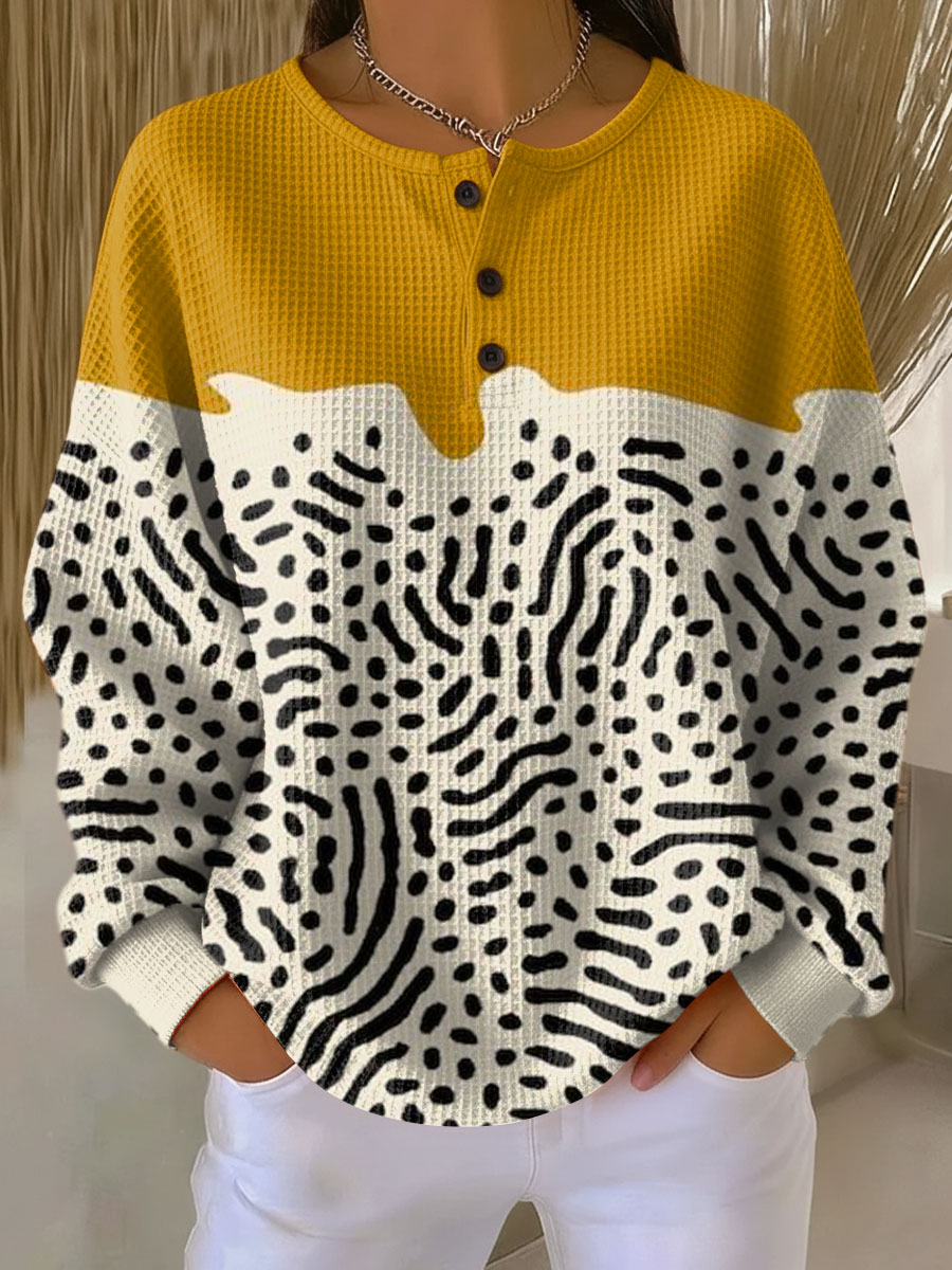 Néféli | Pull gaufré moutarde à motif graphique